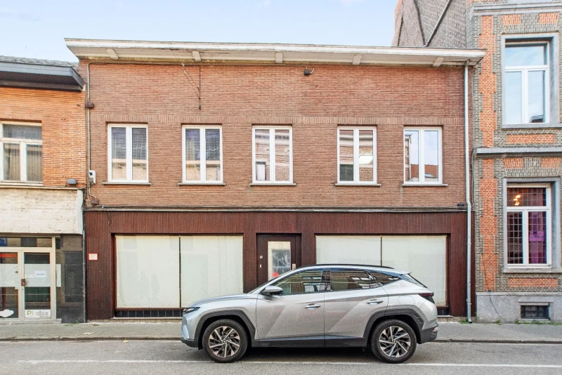 Polyvalente rijwoning met grote handelsruimte te Tienen