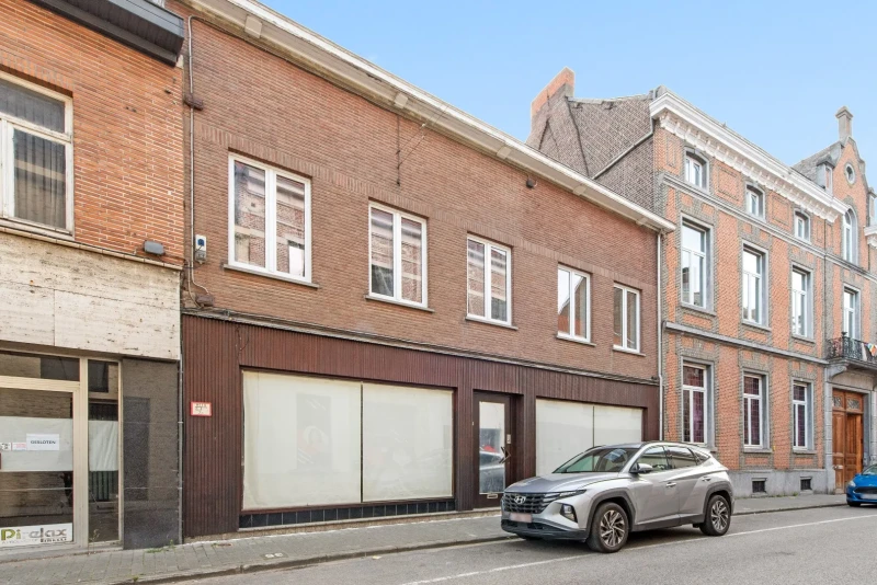 Polyvalente rijwoning met grote handelsruimte te Tienen