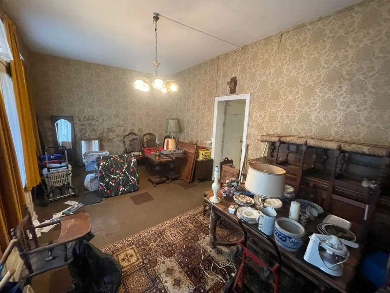 Rijwoning met 5 slaapkamers in centrum Tienen
